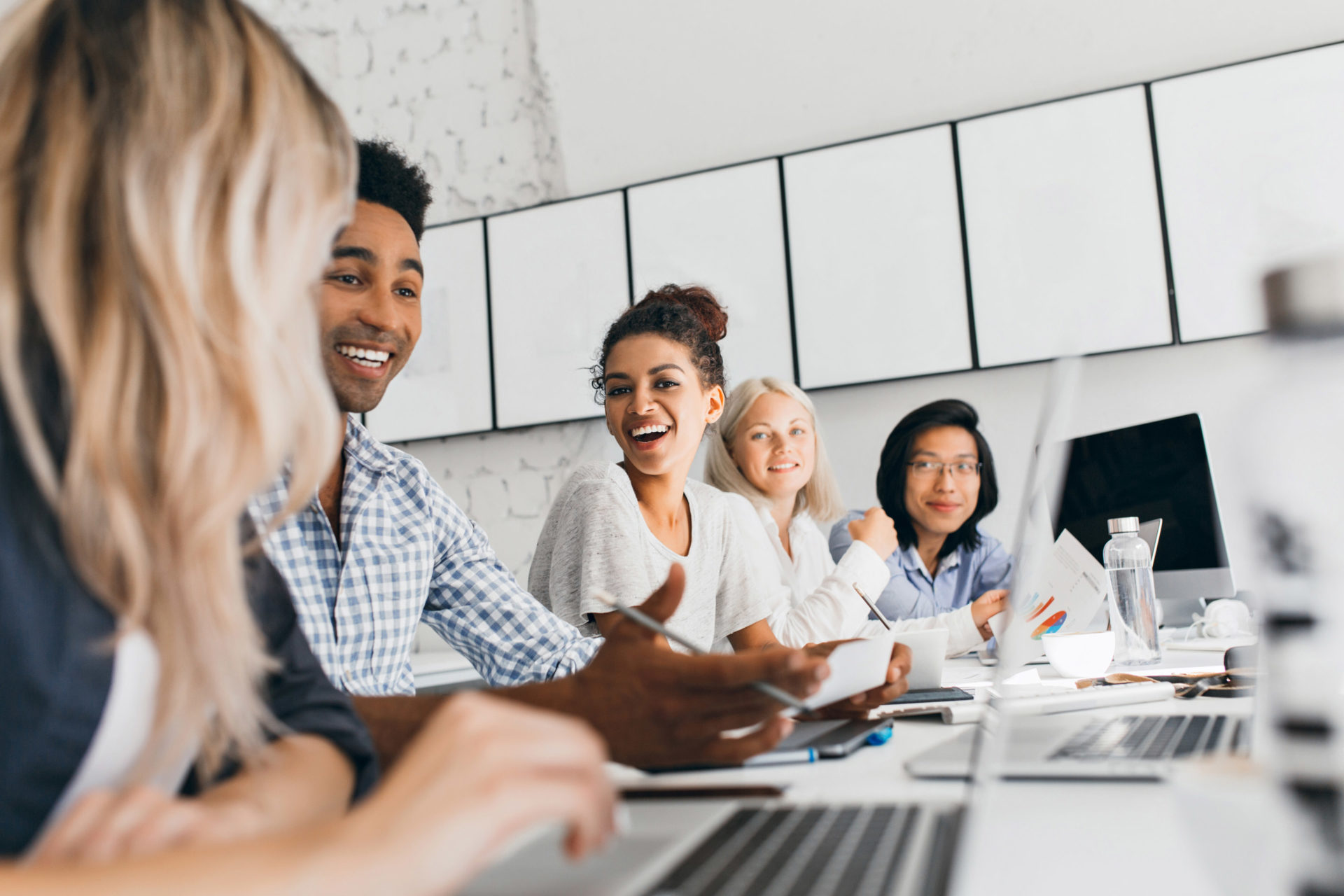 employees at computer working together