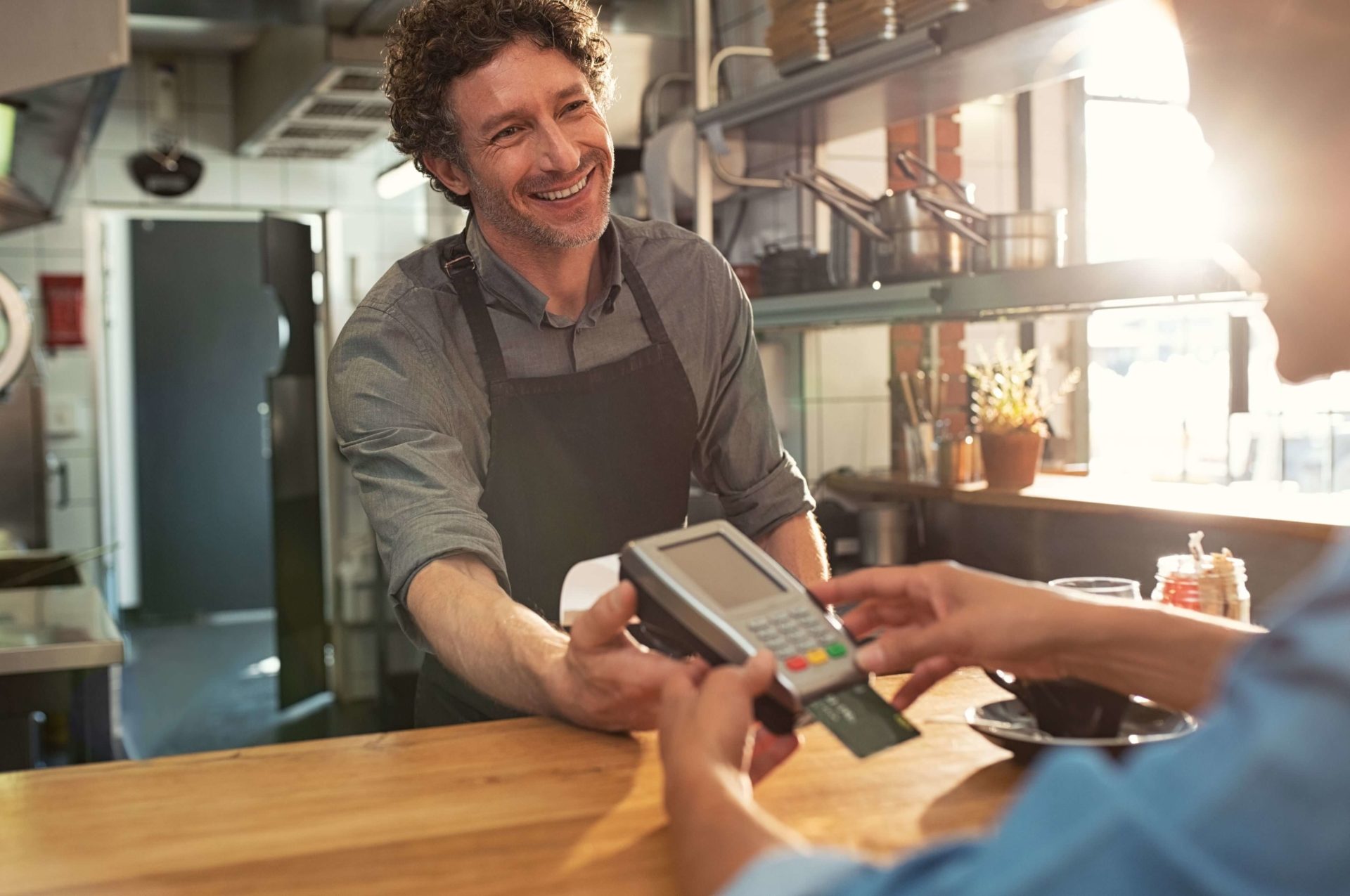 business owner accepting credit card payment